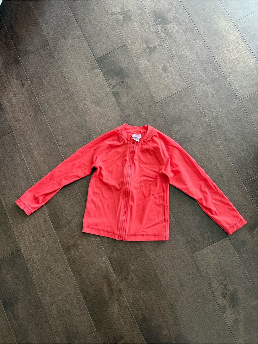 Hanna Andersson Full Zip Rashguard in Coral Luminous 4T